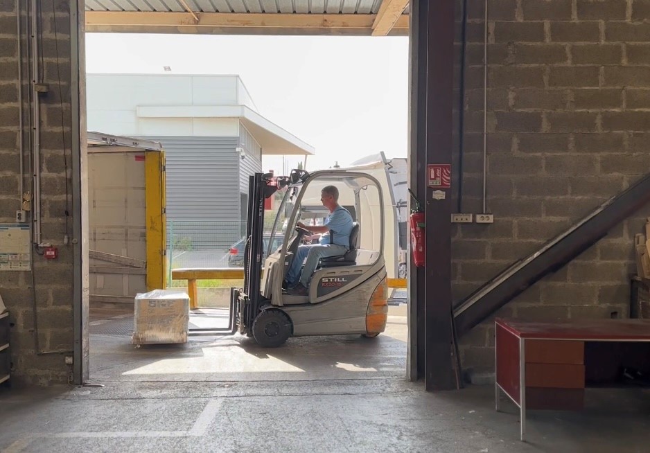Chargement camion avec un transpalette